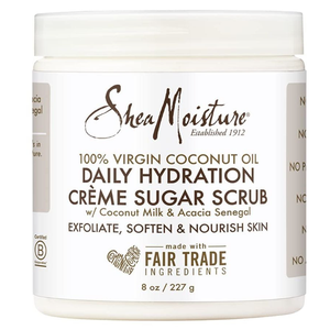 SheaMoisture Daily Hydration Crème Sugar Scrub with 100% virgin coconut oil, coconut milk, and acacia senegal. Exfoliates, softens, and nourishes skin. 8 oz / 227 g. Made with fair trade ingredients.