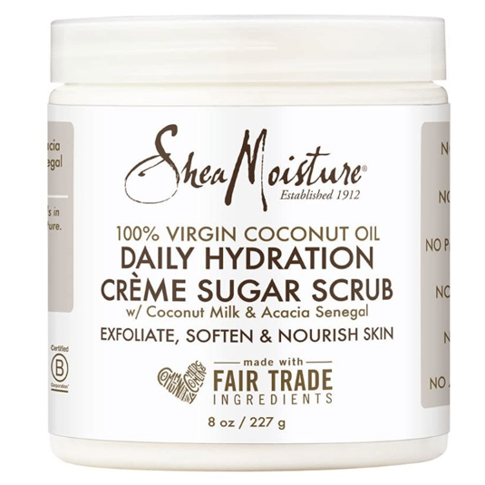 SheaMoisture Daily Hydration Crème Sugar Scrub with 100% virgin coconut oil, coconut milk, and acacia senegal. Exfoliates, softens, and nourishes skin. 8 oz / 227 g. Made with fair trade ingredients.