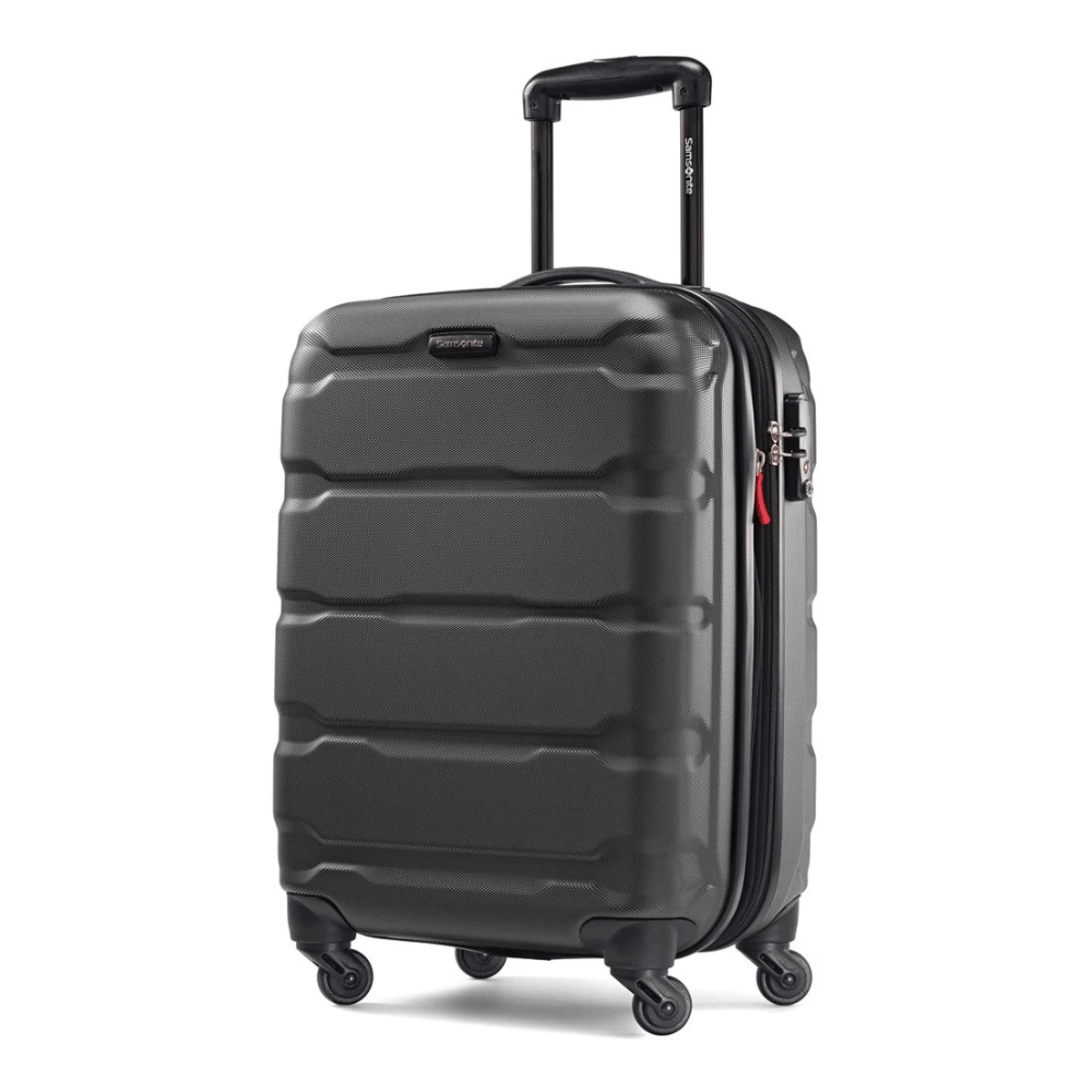 A black hard-shell suitcase with four wheels, a telescopic handle, and a side lock.