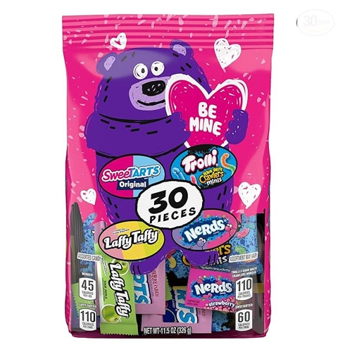 Bag of 30 Valentine's Day candies featuring SweeTARTS, Trolli Sour Brite Crawlers Minis, Laffy Taffy, and Nerds. Bright pink packaging with a cartoon bear and heart motif.