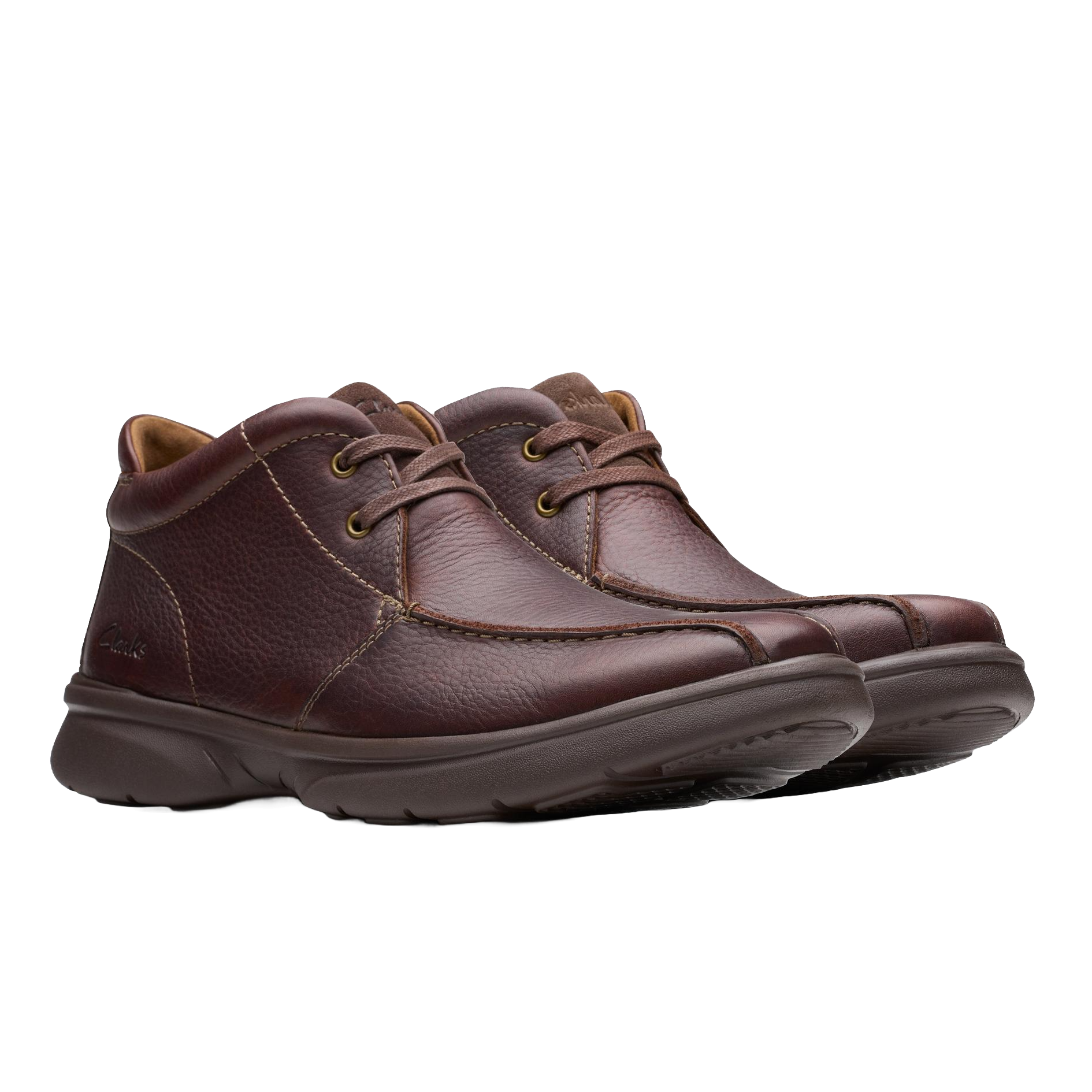 Brown leather lace-up shoes with textured surface and cushioned soles.