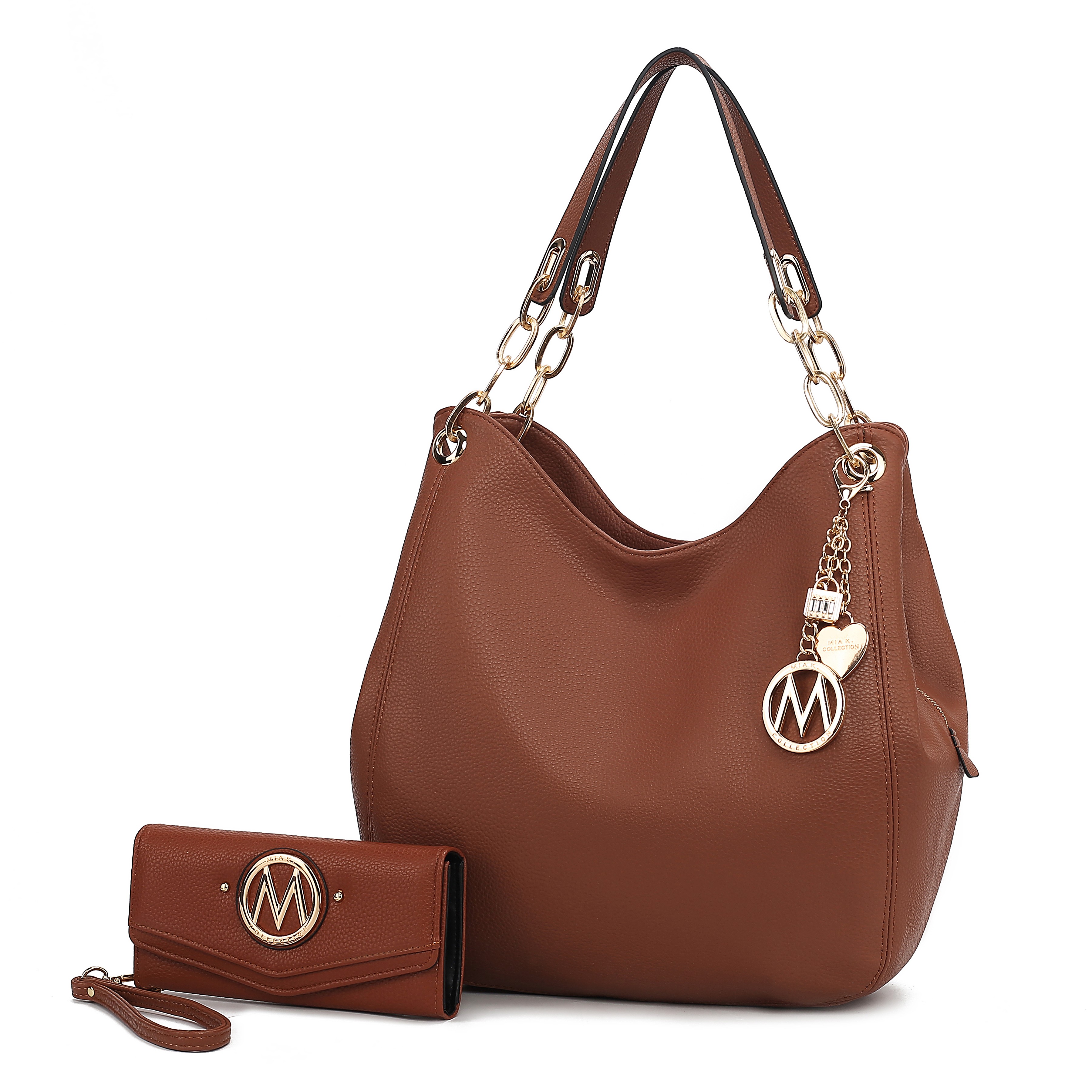 A brown leather handbag with gold chain straps and a matching wallet featuring a circular metal emblem with an \“M\“ logo.
