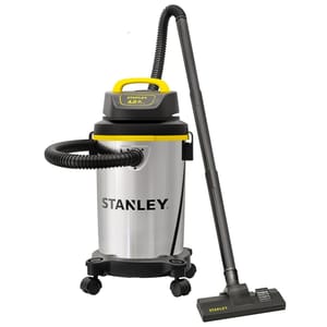 Stanley Shop Vacuum, stainless steel body, 4.0 HP motor, with a flexible hose and floor nozzle attachment, mounted on wheels for mobility.
