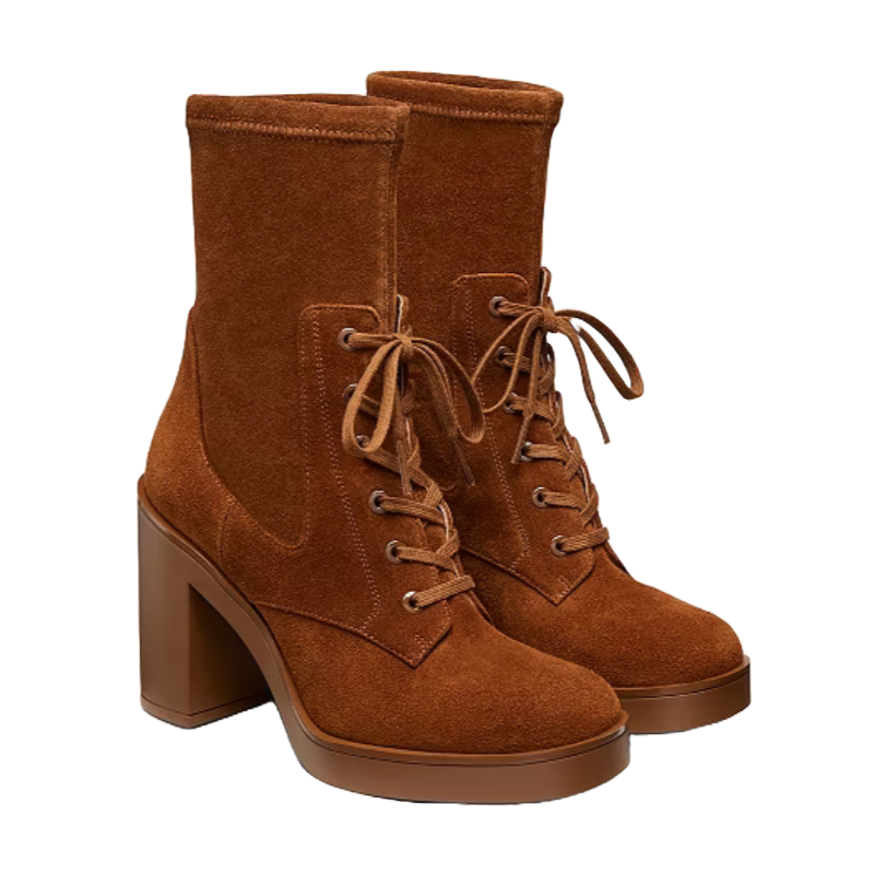 Brown suede ankle boots with high block heels and platform soles, featuring lace-up fronts.