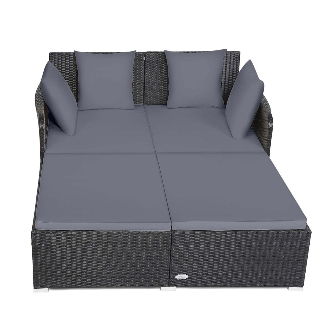 Rattan daybed with gray cushions and four pillows, designed for outdoor use. Suitable for lounging, its structure features a woven pattern and a sturdy frame.