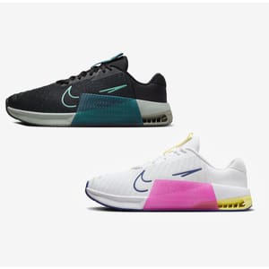 Two pairs of athletic shoes, one black with green accents, the other white with purple and yellow details.