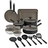 A 20-piece cookware set includes various pots with lids, frying pans, baking sheets, mixing bowls with lids, and kitchen utensils like spatulas, spoons, and ladles, all in a black and taupe color scheme.