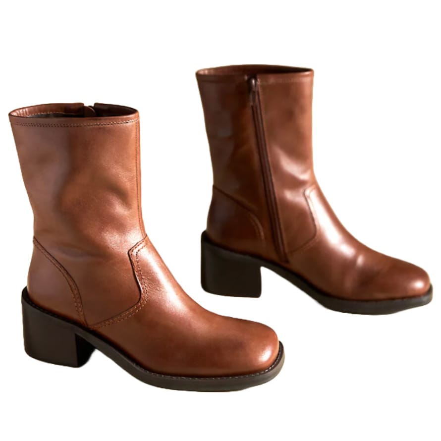 Brown leather mid-calf boots with a rounded toe and a sturdy block heel, featuring side zippers for easy wear.