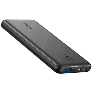 Anker Slim Power Bank features a sleek, black design with a textured finish, a USB-A output, and a USB-C input. It has an LED indicator for battery status.