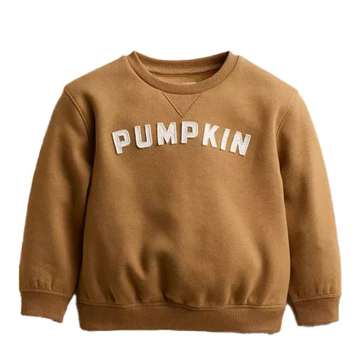 Brown sweatshirt with \“PUMPKIN\“ in white letters across the chest.