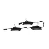 A set of three black LED utility lights connected by a cord with a plug on one end. Each light features a green carabiner for hanging.