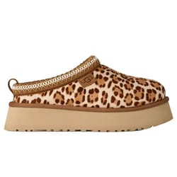 A leopard print UGG slipper with a thick beige platform sole and a decorative woven trim.