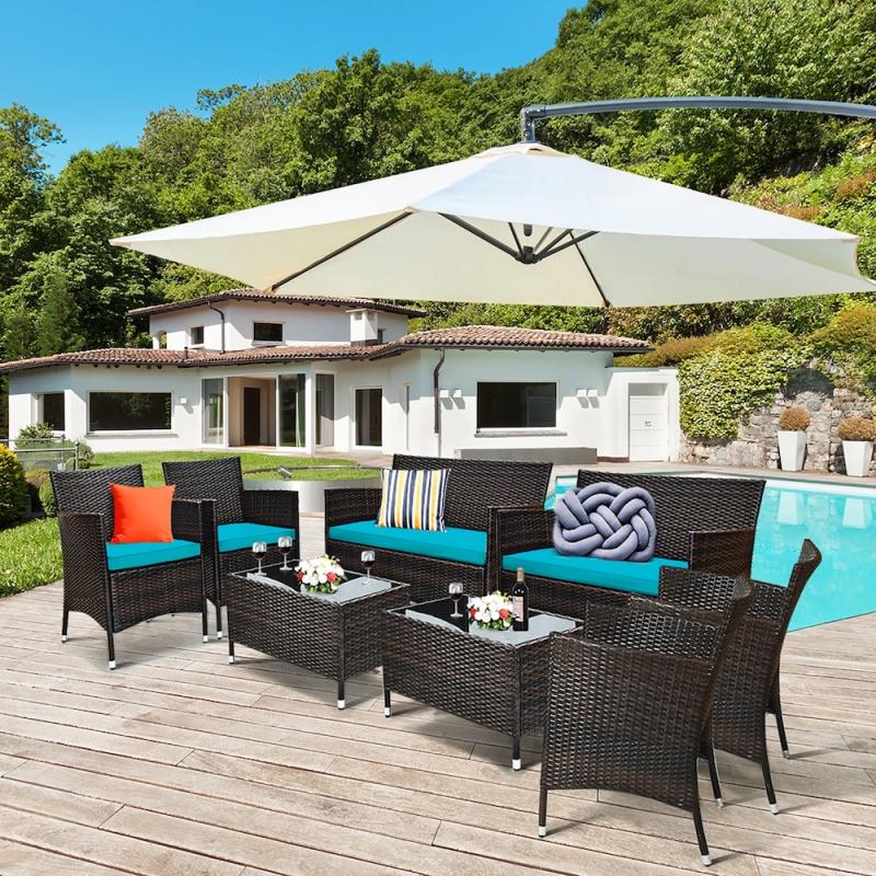 The 8pc Costway Patio Set includes a turquoise-accented arrangement with two loveseats, two single sofas, two ottomans, and two coffee tables, featuring dark brown wicker frames and colorful cushions, set on a deck with a pool and umbrella.
