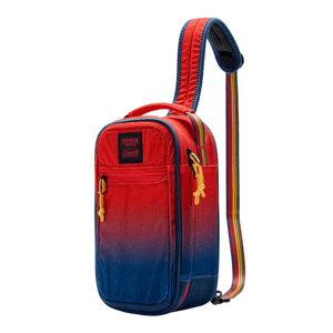 A red and blue gradient sling bag with a single strap featuring \“Stranger Things\“ and \“Coleman\“ branding, yellow zipper pulls, and a multicolored strap.