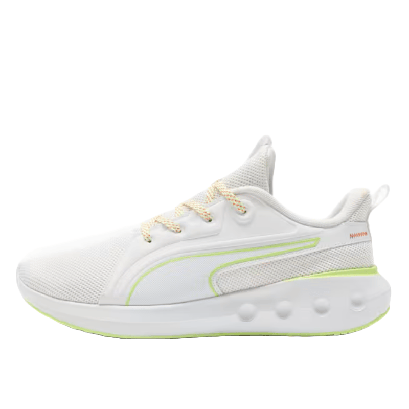 White athletic shoe with mesh upper, yellow accents, and lace-up closure; features a bold side stripe and cushioned sole with embossed detailing.