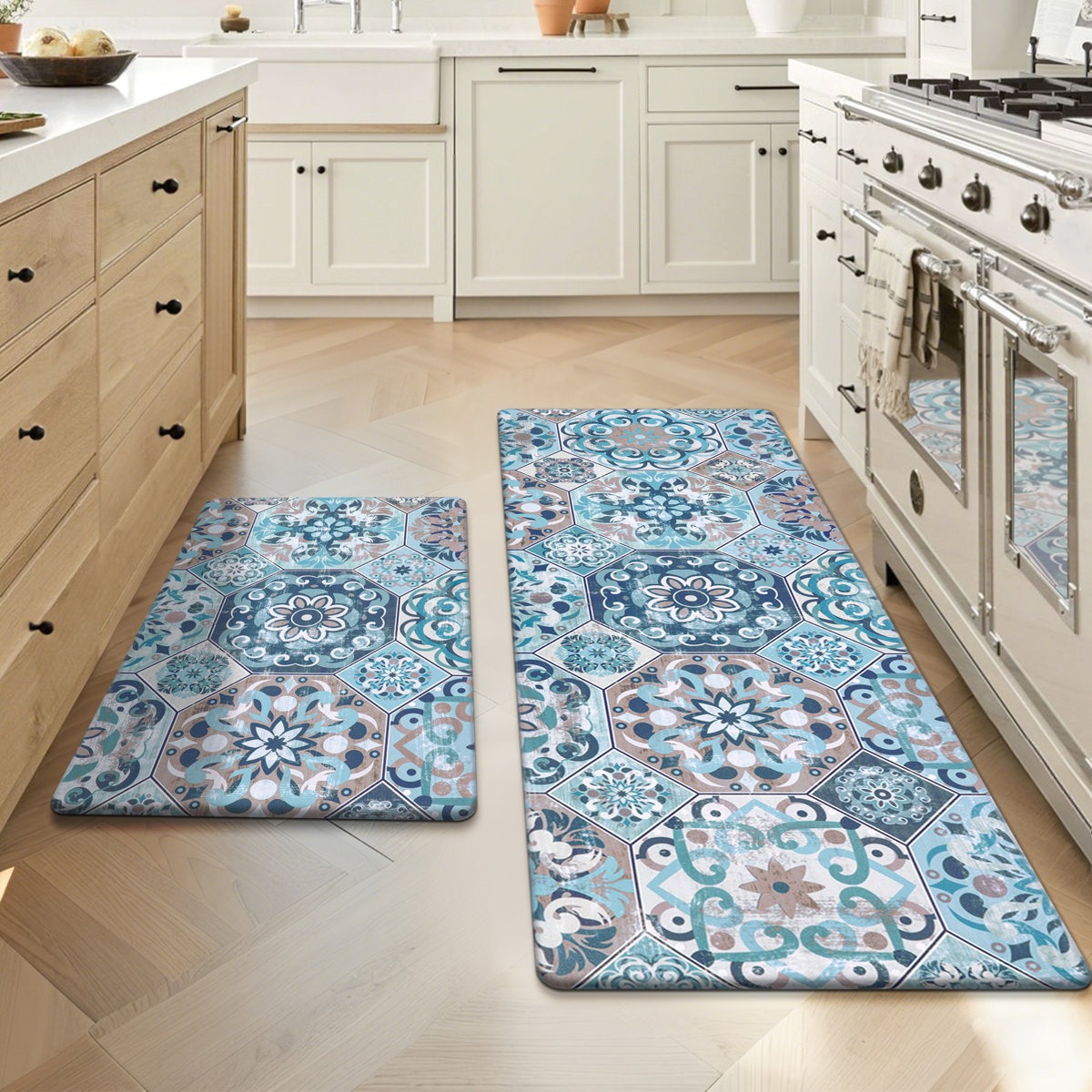 Kitchen features two patterned floor mats with blue and beige geometric and floral designs, placed in front of a stove and sink.