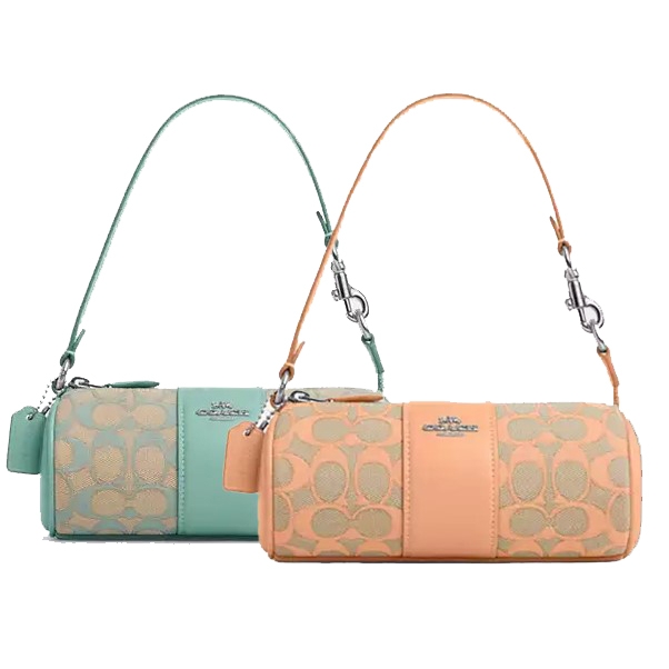 Two cylindrical handbags with patterned designs and shoulder straps, one in turquoise and the other in peach.