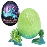Crystallynx Dragons mystery egg with a green textured shell containing dragon figure parts.