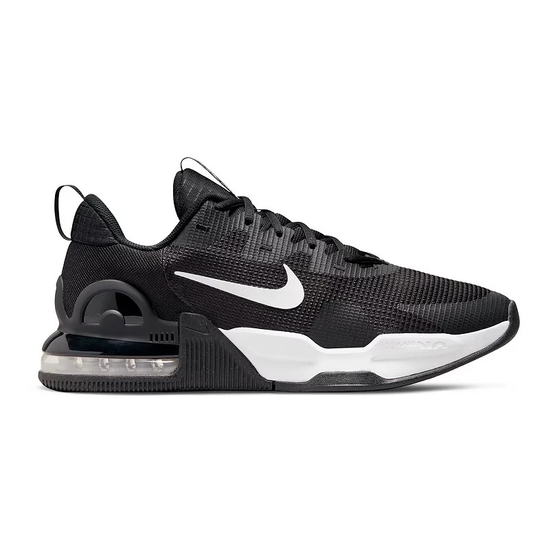 A black and white athletic sneaker with a visible air cushioning unit in the heel.