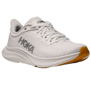 Hoka running shoe featuring a light-colored design with a textured upper, logo on the side, and a contrasting gum-colored outsole.