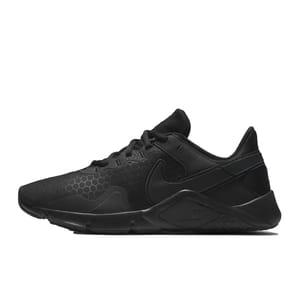 Black Nike running shoe featuring a textured upper with subtle hexagonal patterns and a sleek, lightweight design.