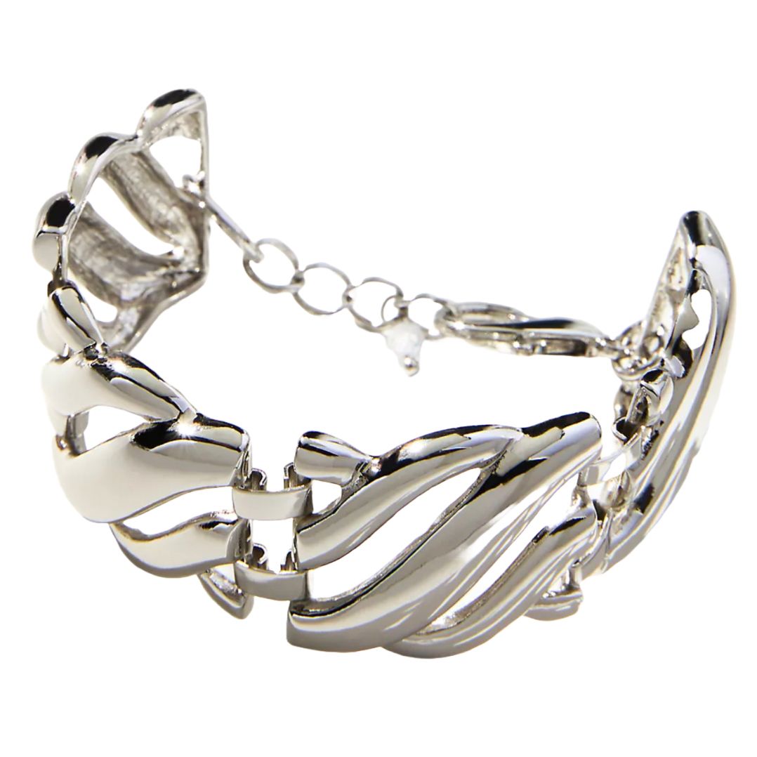 This is a chunky, silver bracelet featuring wide, wavy interconnected links with a shiny finish and an adjustable chain for closure.