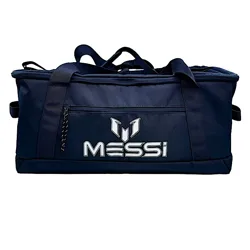 A dark blue duffel bag with \“MESSI\“ and a stylized \“M\“ logo printed on it.