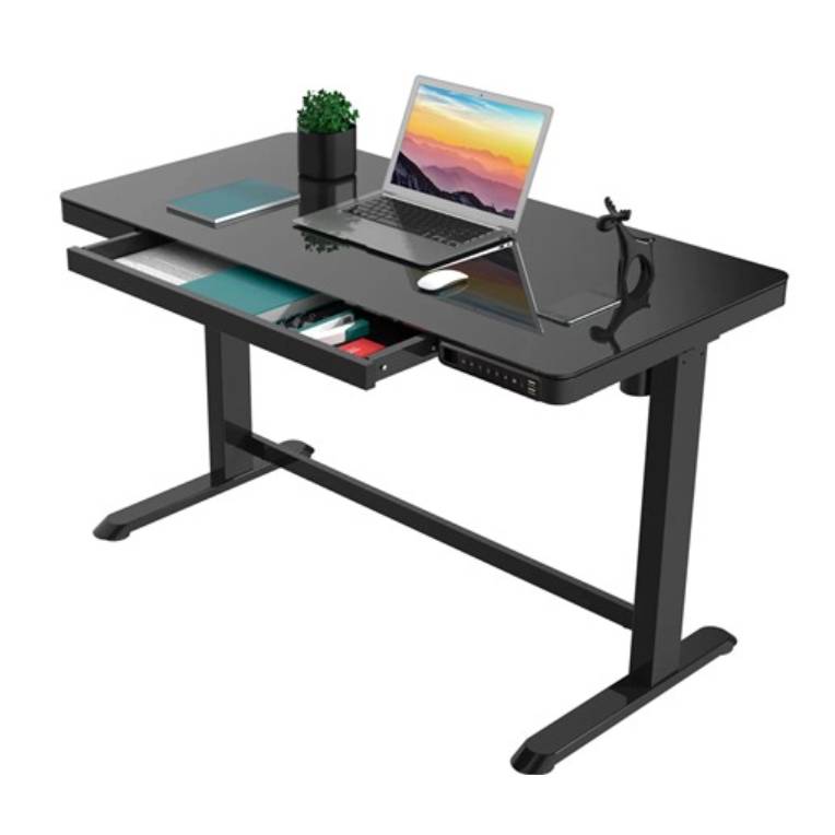 A black standing desk with an adjustable frame, featuring a laptop, plant, and storage drawers.