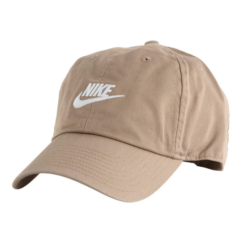 A beige Nike baseball cap with an embroidered white logo on the front.