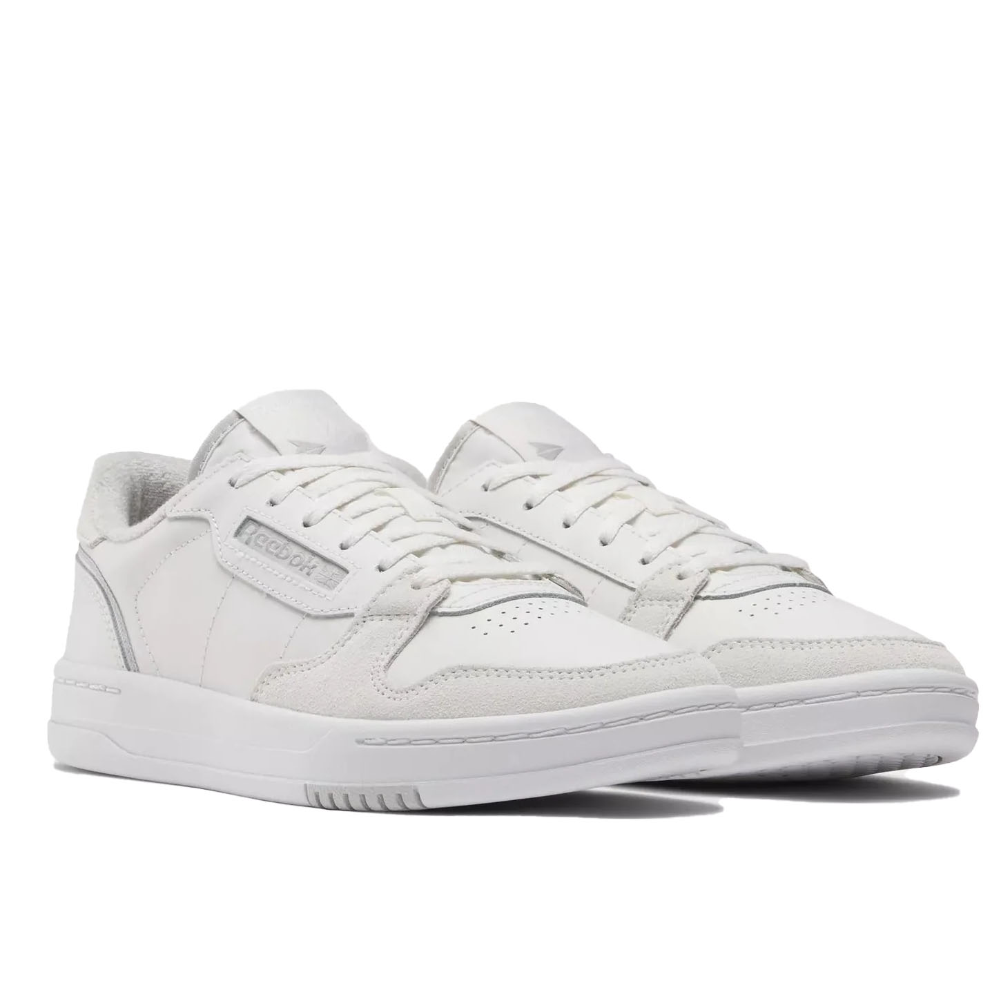 A pair of white Reebok sneakers with a classic low-top design, featuring a leather and suede upper, perforated toe box, and branding on the side.