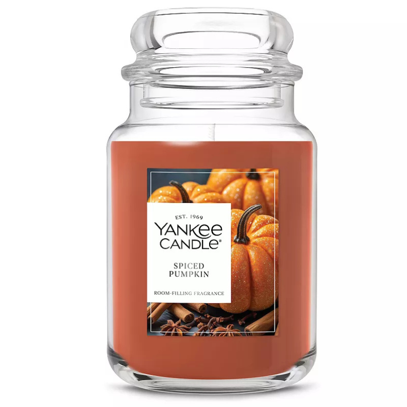 Yankee Candle Spiced Pumpkin. Room-filling fragrance in a large glass jar with images of pumpkins and cinnamon sticks on the label.