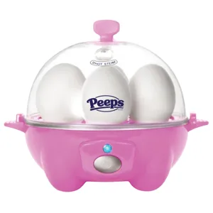 A pink egg cooker labeled \“Peeps\“ with a transparent lid is shown, containing three eggs inside.