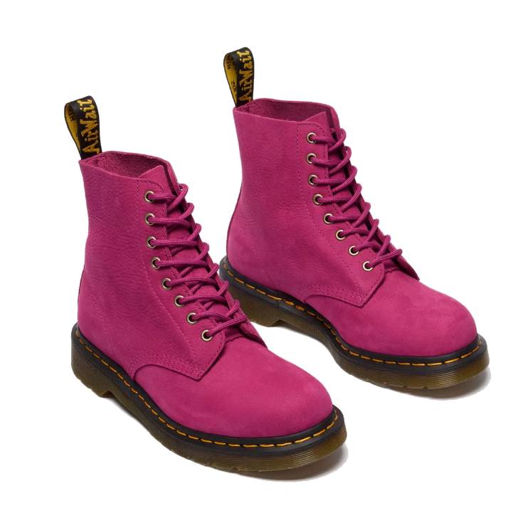 Pink lace-up boots with a sturdy sole and yellow stitching.