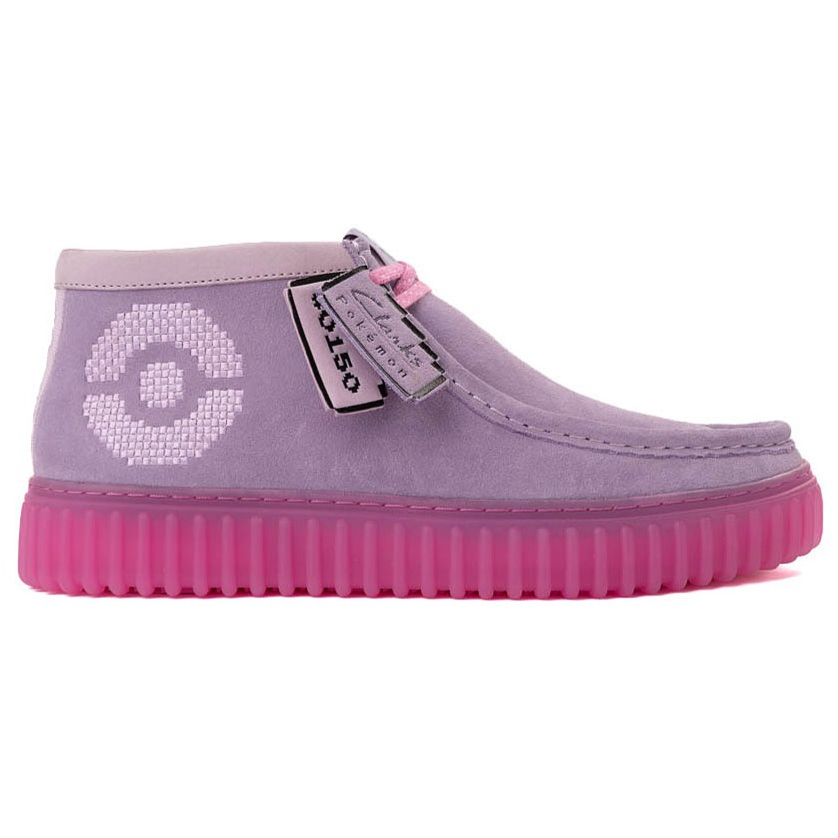 Light purple shoe with a ribbed pink sole, featuring a circular pixelated pattern on the side and two tags attached to the laces with \“Clarks\“ and \“Consoles\“ branding.