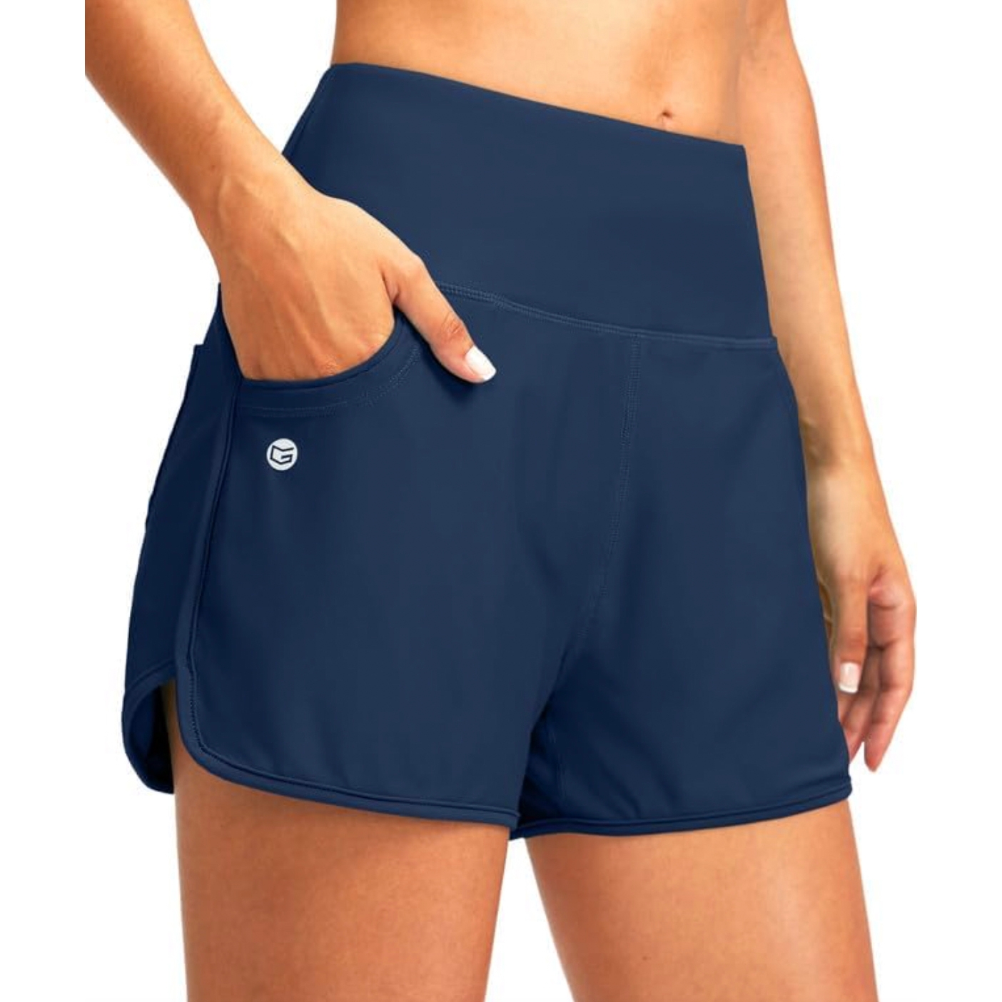 Navy blue women's swim shorts with a high-waisted design, featuring side pockets and a small logo on the left.