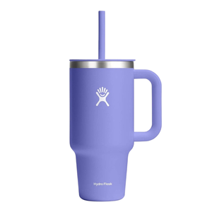 A purple Hydro Flask tumbler with a handle, straw, and stainless steel rim.