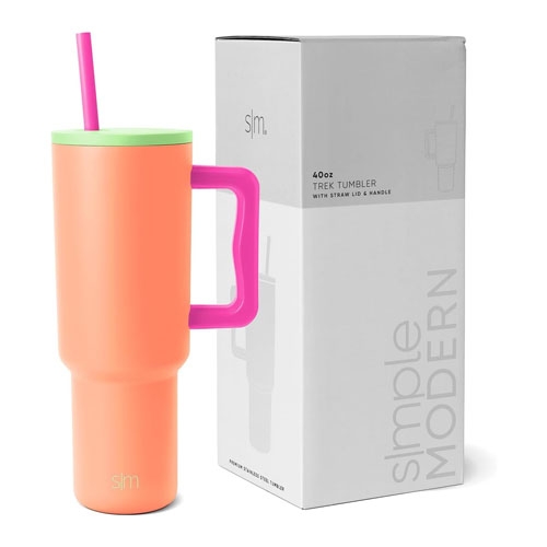 A coral-colored 40oz Simple Modern insulated tumbler with a pink handle and a green straw, next to its box.