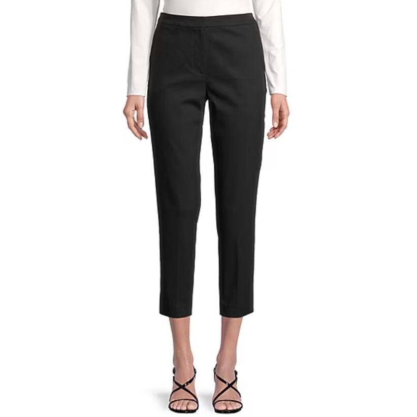 Black slim-leg pants with a flattering fit, featuring a mid-rise waist and cropped length, paired with a simple ankle-strap sandal. Ideal for both casual and formal occasions.