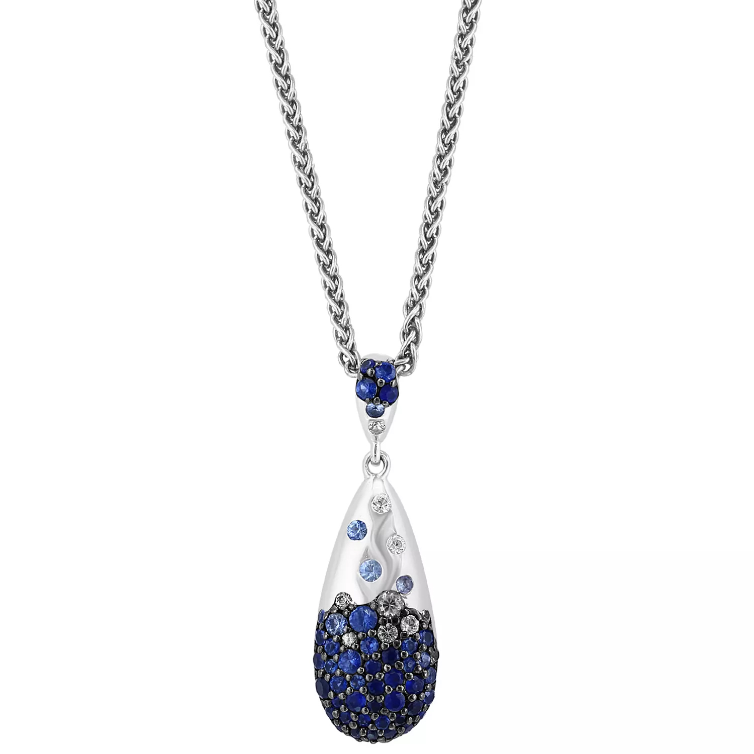 A silver necklace features a teardrop-shaped pendant adorned with blue and clear crystals, suspended from a silver chain.