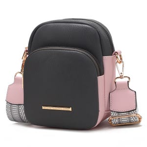 A stylish black and pink crossbody bag with gold-tone hardware and an adjustable strap, featuring the brand \“MIA.K COLLECTION\“ on the front.