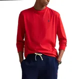 A person is wearing a red long-sleeve shirt with a small blue logo on the chest and navy blue pants with a drawstring.