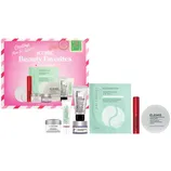 A beauty gift set featuring products like Patchology eye gels, Elemis facial pads, Lancôme moisturizer, Grande Cosmetics lash serum, It Cosmetics eye cream, and Peter Thomas Roth serum.