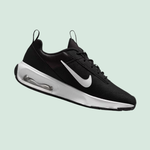 Black athletic shoe with a white swoosh logo, featuring a transparent air cushion in the sole and pull tabs on the tongue and heel.