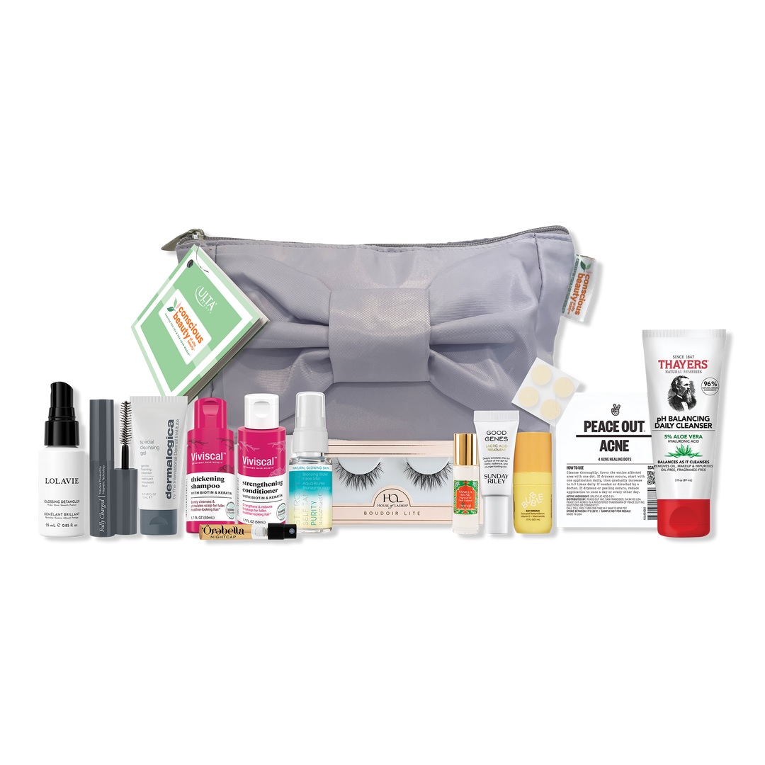 The Ulta Holiday Radiance Beauty Kit includes a variety of skincare and haircare items such as serums, mascaras, cleansers, lashes, and shampoos, all packaged in a stylish bow-designed pouch.