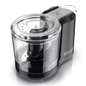 A Black+Decker food processor with a clear container and black base, featuring a visible blade mechanism inside.