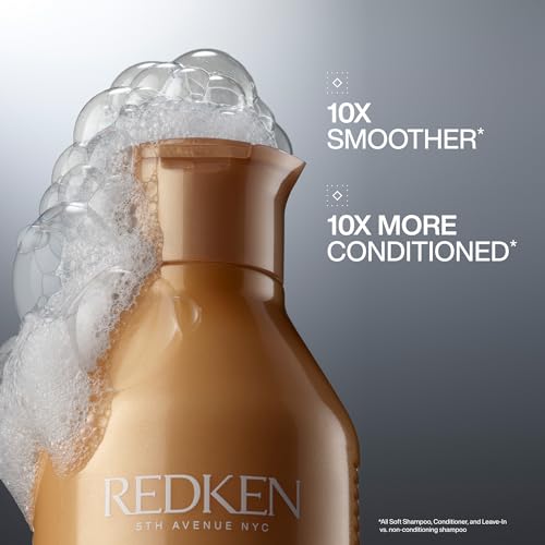 Redken 5th Avenue NYC shampoo bottle covered in bubbles, with claims of making hair \“10X smoother\“ and \“10X more conditioned.\“
