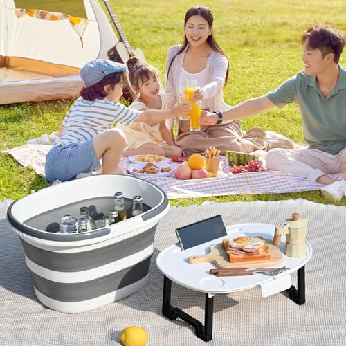 Collapsible bucket with beverages and a portable folding table featuring snacks and drinks; family enjoying a picnic in the background.