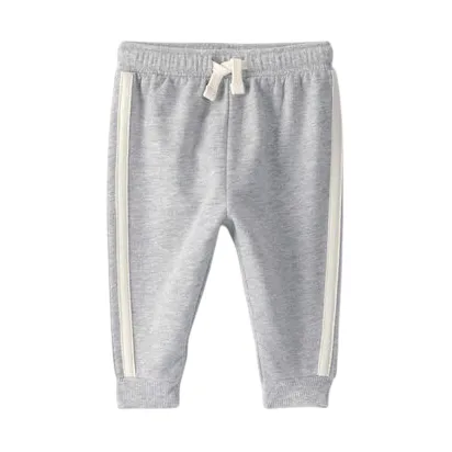 Gray toddler joggers with an elastic waistband, a drawstring, ribbed cuffs, and white side stripes.