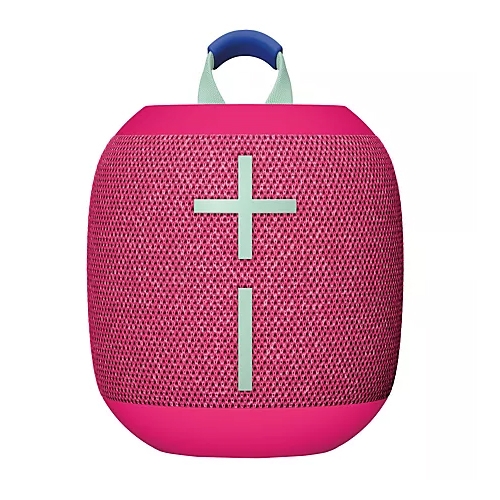 A pink Logitech Wonderboom 4 Bluetooth speaker with a cylindrical shape, featuring a large plus and minus sign on the front for volume control and a blue handle on top for portability.