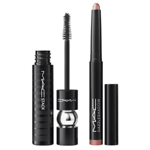 A MAC Stack mascara with a volumizing brush alongside a MAC Dazzleshadow eyeshadow stick in a shimmery pink shade, both in sleek black packaging.